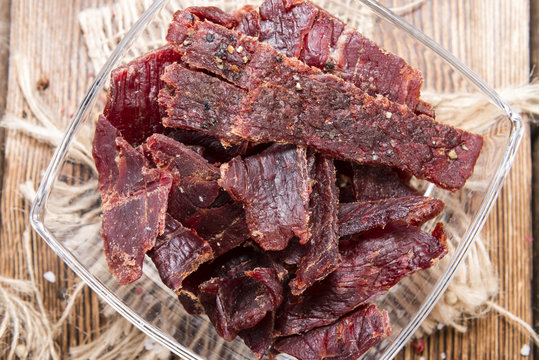 Beef Jerky on wooden background