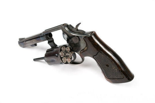 Black revolver gun isolated on white background