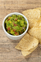 Bowl of Guacamole dip and nachos