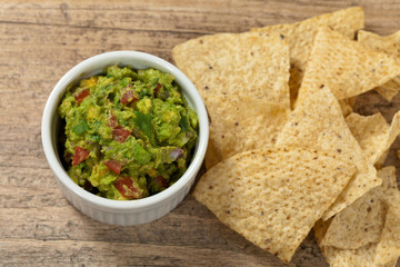 Bowl of Guacamole dip and nachos