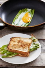 Asparagus ith egg on pan c