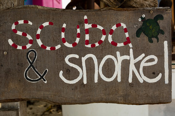 scuba and snorkel sign