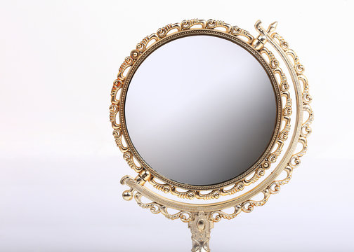 golden makeup mirror isolated