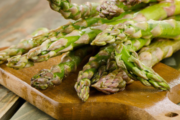 Asparagus on wooden table