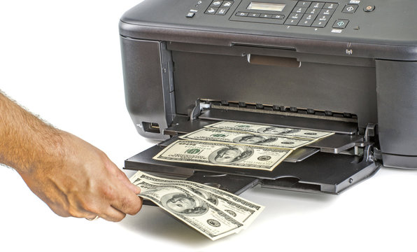 Printer printing fake dollar bills