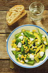 salad with corn, spinach and avocado