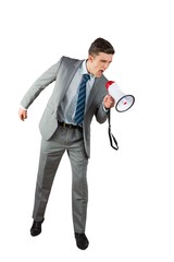 Angry businessman shouting through megaphone