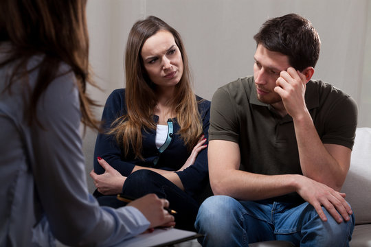 Unhappy couple on psychotherapy session