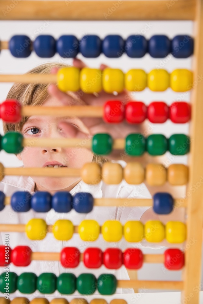Poster student doing maths on abacus