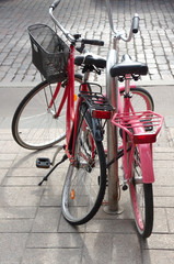 Fototapeta na wymiar Two bikes parked on street