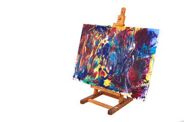 Easel with abstrakt painted canvas - 69663320