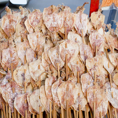 roasted squid selling in the street of bangkok