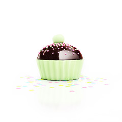 green chocolate cupcake with cherry on top and confetti