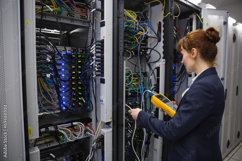 Aufkleber happy technician using digital cable analyzer on server