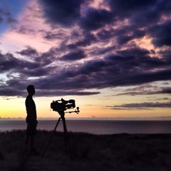 cameraman at sunset - 69668160