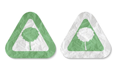 triangles with a texture of crumpled paper and tree symbol