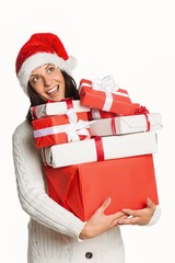 Smiling woman with christmas presents