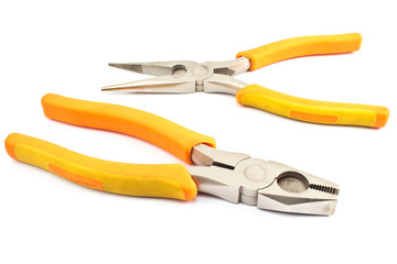 Two yellow pliers isolated on  white