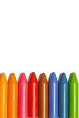 Colourful crayons in a row