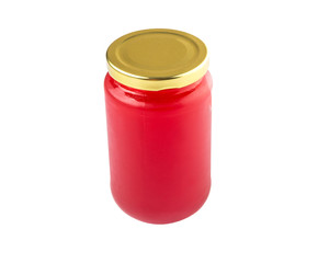 A bottle of strawberry jam over white background 