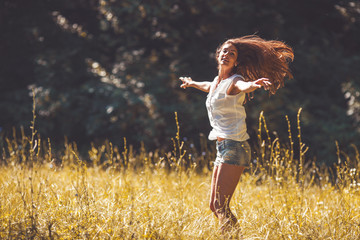 Attractive female relaxing in nature