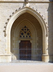 Monumental ornameted gothic gate with lattice