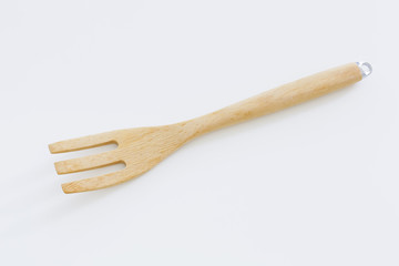Wooden kitchen utensils. Isolated on white background
