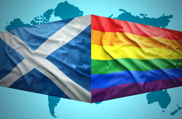 Waving Scottish and Gay flags