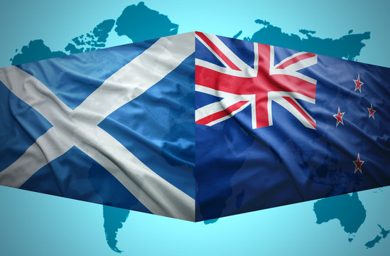 Waving Scottish and New Zealand flags