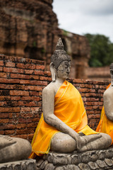 Ancient Buddha statue at Chaiwatthanaram Temple, Ayutthaya