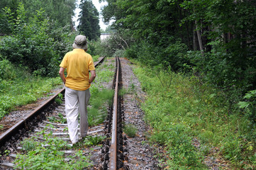 Walking Away Down Railroad Track