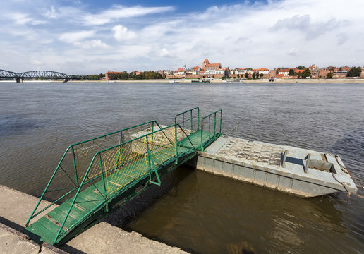 Pier on the Vistula river bank in Torun, Poland.