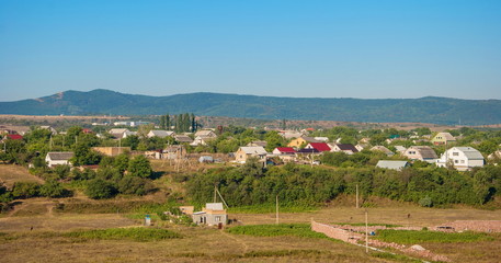 Fototapeta na wymiar Crimean mountain landscape with village in valley