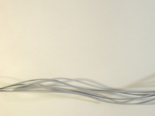 Flowing Strings or Ribbons on a warm textured background
