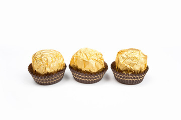 chocolate ball candy isolated on white background