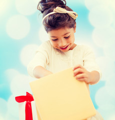 happy child girl with gift box