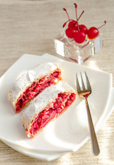 Cherry strudel on the square plate