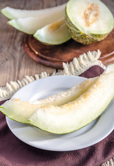 Piel De Sapo Melon On The Wooden Background