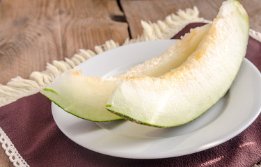 Piel De Sapo Melon On The Wooden Background