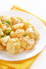 Cauliflower baked with egg and herbs