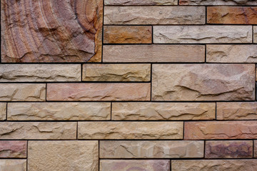 Sand stone bricks wall for background.