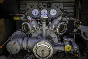 Obraz na płótnie Canvas Firefighting machine hydraulics tool of fire engine
