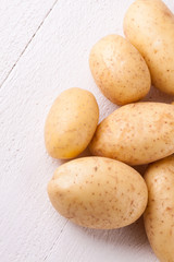 Fototapeta na wymiar Farm fresh washed whole potatoes