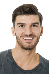 Handsome bearded young man with a lovely smile