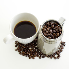 Coffee cup and coffee bean on white background