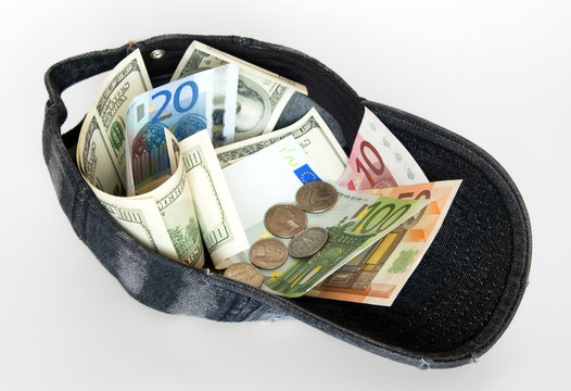 Cap of Money, Dollars and Euros.