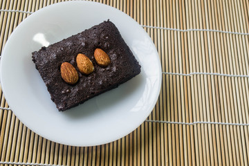 Cakes, brownies, sprinkle almonds.