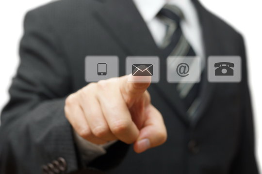 Businessman pressing virtual ( mail,phone,email ) buttons. cutom