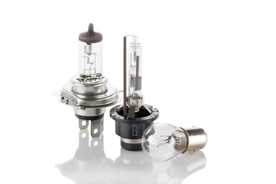 three automotive bulbs isolated on white