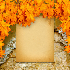 Naklejka na ściany i meble Old paper listing on old brick wall with bright orange autumn le